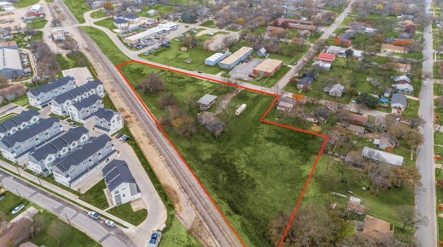 RARE turnkey in Prime location with existing plans to include 33 townhomes.  The word is out Tarleton is D-1 and the buying window is short before the large funds come to town.  With Tarleton State University less than 1 mile, this property offers investors an opportunity to capitalize on the demand needed for student housing.   Zoned for both residential (R-2) and industrial use, the site provides flexibility for multiple development strategies in addition to the student housing.  Adjacent to the newly developed Purple Rail townhomes, the property is ideally positioned to attract consistent rental demand and long-term appreciation. The 33 townhome units were developed by a team of architects, engineers and project managers.  This is ready to go saving you significant time and money in the development process.  Get in before you can not afford to!