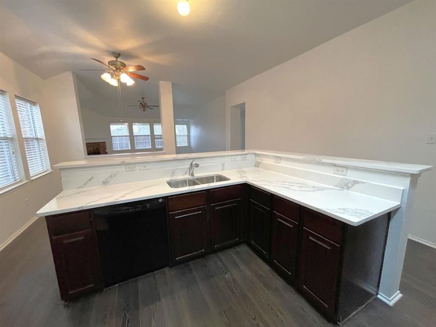 This beautiful home is perfect layout for individuals, couples or families. Great location in McKinney feeding into Prosper ISD. Check out the brand 
 new quartz countertops in the kitchen! Gorgeous wood look flooring and newer carpet. Decorator lighting. Split floor plan with an open gameroom between the two secondary bedrooms. Kitchen has gas stove, build in microwave. Great big backyard with covered patio for your outdoor enjoyment. Community pool and playground.