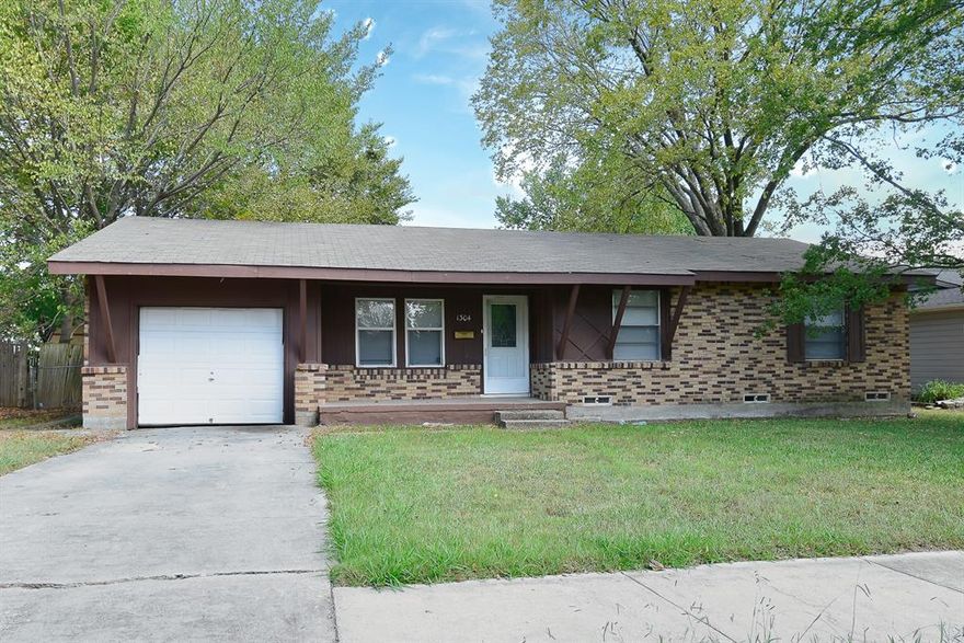 This three bedroom home has two baths, central heat and air, carpet and vinyl. There are washer dryer connections. Large fenced yard and a one car garage.  Close to Crockett School.