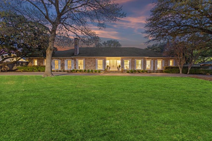 Sitting on a .5 acre elevated lot in the coveted Russwood Acres, this gorgeous traditional 1 story home has it all! Spacious rooms for entertaining, 4 ensuite bedrooms. A living room with stunning gas fireplace. Light filled dining room that is a hostess dream. From the foyer you are welcomed into a  large den that features a wet bar that opens to the pool, built in bookcases, fireplace and boasts views of the newly resurfaced pool and landscaped back yard. The oversized primary bedroom also has views of the pool along with dual sides vanities in the bathroom, & two walk in closets with built-in cabinetry. The playroom can be used as flex space, turned into a great gym, home office or mudroom. The rear entry garage is accessed through an electronic driveway gate just off of the circular driveway. Enjoy the gated pool with integrated safety cameras. This property had significant updates within the last year and is getting a new roof by mid April. It's ready for its next owners to enjoy!