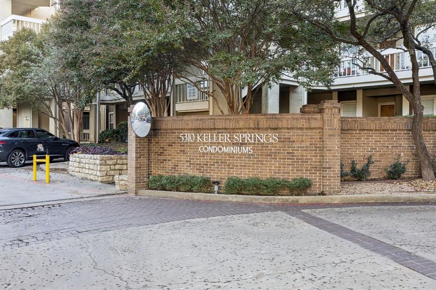 Perfectly situated on the 2nd floor, this condo in the gated Keller Springs community offers comfort and convenience. Enjoy serene pool and courtyard scenery right from your private patio.
The open living area features recessed lighting, a ceiling fan, a cozy fireplace, and low-maintenance flooring. The spacious L-shaped kitchen opens to living and dining area.  Kitchen includes an electric range, breakfast bar, built-in microwave, ample cabinetry, and a refrigerator. 
The primary suite delivers great functionality with dual sinks, a glass-enclosed shower, and a generous walk-in closet. The community’s beautifully maintained pool area offers a spa and hot tub, perfect for unwinding.
Additional perks include convenient proximity to the elevator, two assigned parking spaces (one covered), and a prime location just minutes from US-75, the Dallas North Tollway, I-635, and only 10 minutes from UTD.