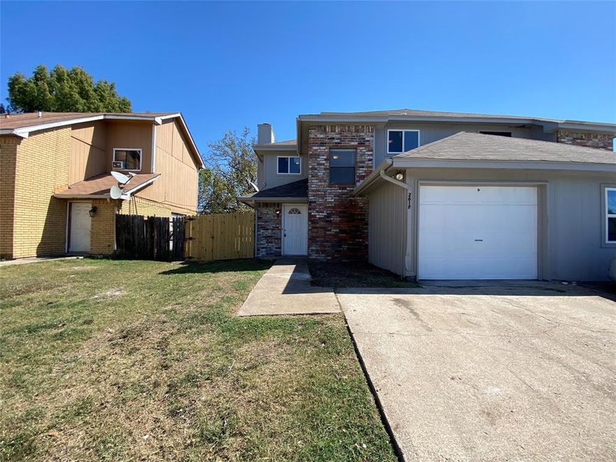 This is an adorable 3 bedroom, 2 bathroom duplex located in Grand Prairie! It has a wood-burning fireplace in the living room, luxury vinyl plank downstairs, new carpet upstairs, a spacious kitchen with a bar area for extra seating, updated bathrooms downstairs and up, and fresh paint throughout. The backyard allows for all of your entertaining needs, and the one car garage is attached! This property will not last long; call to set up a showing today!