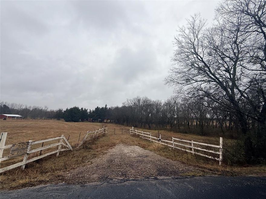 Discover the ideal blend of peaceful country living and in-town convenience with this 9+ acre property just outside the Farmersville city limits. Perfect for residential, agricultural, or recreational use, this versatile acreage is ideal for families, hobby farmers, ranching enthusiasts, or those seeking land to build a custom dream home. Conveniently located near schools, baseball fields, and town amenities, while still offering privacy and open space. The property features mature trees, a serene pond, and gently rolling land, creating a scenic and functional setting. All utilities are already in place, including water meter, electric meter, and septic system, providing a head start for future construction. Additional improvements include multiple storage buildings, a designated RV parking area, and two large barns ready for livestock, equipment, or workshop space. Whether you’re looking to build, farm, invest, or enjoy wide-open Texas land, this Farmersville acreage offers endless possibilities. Schedule your private showing today and explore the potential of this exceptional property.