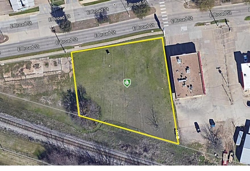 Approximately .64 acre Commercial Lot on East Broad Street.  It is Prime Development for a Fast Food Restaurant, Medical Office or General Office.  This property is located next to Dairy Queen and close to City Hall, Police Station, Fire Station, MISD School and the Municipal Buildings.  Less than a mile off US HWY 287 and Downtown Mansfield.