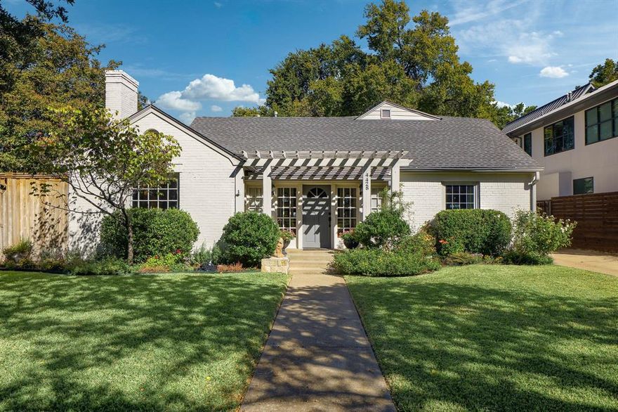 This delightful University Park cottage, feeding to Hyer Elementary, has been a happy home filled with laughter, family gatherings, and the joy of everyday living. It’s a home that welcomes everyone— anyone wanting to put down roots in one of the most cherished neighborhoods in Highland Park ISD. Lovingly maintained and thoughtfully updated, this home sits on an oversized 83x145 lot that offers both space and possibility, with a deep backyard ideal for play, entertaining, or even future expansion. Inside, natural light fills a versatile layout that lives easily for any lifestyle, with a downstairs primary suite, a professional-grade kitchen, and flexible spaces including two home offices, a cozy living room with fireplace, and a sunny dining area open to the kitchen, where the homeowner is a professional baker. The generous front entry can serve as a welcoming sitting area or gallery, adding to the home’s charm and livability. Upstairs, two spacious bedrooms, built-ins, and ample storage provide room for everyone. Set among tree-lined streets and friendly neighbors, this home’s location is truly special—walkable to Hyer Elementary, local restaurants, coffee shops, and exercise studios along Lovers Lane. The longtime owners have treasured every moment here, and now this cheerful, inviting home is ready to welcome its next chapter and new memories.