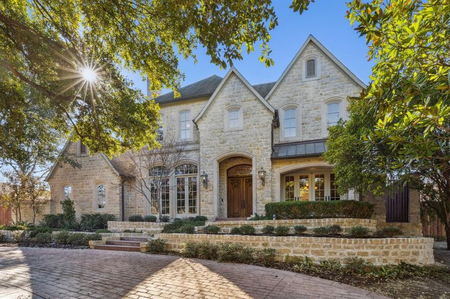 Feel at home as soon as you step into this spectacular custom home built by an award winning builder and designer. Traditional home with gleaming hardwood floors, classic hardwood and travertine inlayed floors, a grand staircase and gorgeous entry. The gourmet kitchen is a fusion of granite counters and Monogram appliances, ready to follow your culinary directions. Primary bedroom is located on the main-floor and the primary bathroom has heated floors. Three secondary bedrooms, one downstairs and two upstairs, have ensuite bathrooms and large closet space. Privacy fencing adds seclusion to the landscaped yard and pool. Circular driveway, makes for stylish arrivals, is connected to a drive up to the attached three-car garage with an electric gate. Dog run with turf. Various shopping and dining just minutes from Northpark and Galleria Malls. This lovely abode is a special find in the Preston Area and will check all your must have boxes. Carpet and paint credit with acceptable offer.