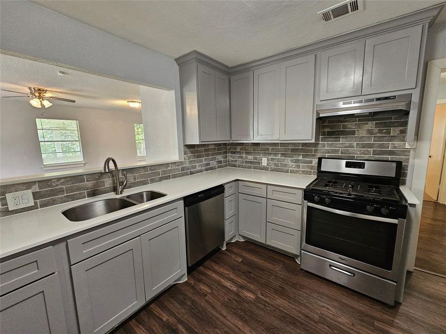 Welcome to this hidden gem four bed and two full baths in the heart of Hurst, TX offering ample space for comfort and convenience.

The house features two separate living spaces, perfect for entertaining or simply relaxing. The flooring is a tasteful mix of ceramic tile and carpet, adding a touch of elegance to the home. The dining area is complemented by an eat-in kitchen, equipped with stainless steel appliances, a gas range, and modern shaker cabinets.

The kitchen is further enhanced by a stone backsplash and quartz countertops, adding a touch of luxury. The back porch is a highlight, covered and fitted with two ceiling fans, it provides a perfect outdoor retreat. This home is a blend of style and functionality, waiting to be your perfect abode.