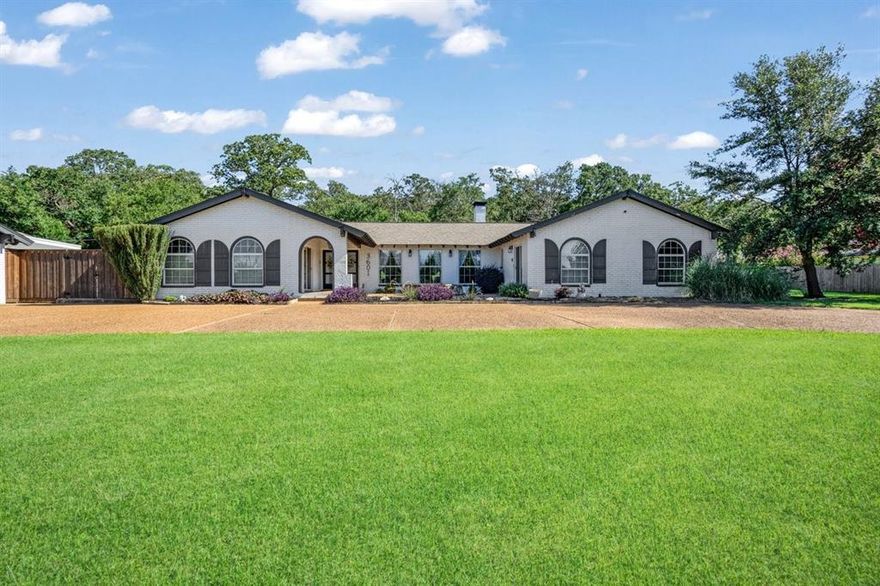 An exceptional one of a kind 4 br, 3 bath updated home, boasting over 3,100 sq.ft on two lots at approximately 2.527 acres with a pool, outdoor living and entertainment area, two detached garages, RV hookup and parking with a welcoming large circle drive providing a gorgeous curb appeal amongst the native landscaping.  Located in the desirable and convenient Spring Creek Estates off of Hwy 120, but within Denison city limits, and minutes to all amenities, all the while living on acreage with a country, peaceful vibe. This tasteful home with an updated large kitchen is an envy to all bakers, has quartz countertops, gas range and oven, custom cabinetry, nickel hardware with soft close hinges throughout.  Open concept living and dining flows from the kitchen, to the dining, to the living area for family gatherings. Four large bedrooms and 2 full baths occupy the east wing with ample storage throughout the entirety of the home.  Plenty of natural light throughout the home with exception of the very large theater seating media room in the west wing near the 3td bath and utility hall.  All you need is a movie. golf, NFL and some popcorn!  Step outside the west wing doors and find yourself in the outdoor living area surrounded by a pool and two detached garages which can occupy five vehicles, additional storage, and again, RV parking with updated electrical hookup.  This is a rare find within city limits, so best book your tours quickly while the price is right!  Lovely home!