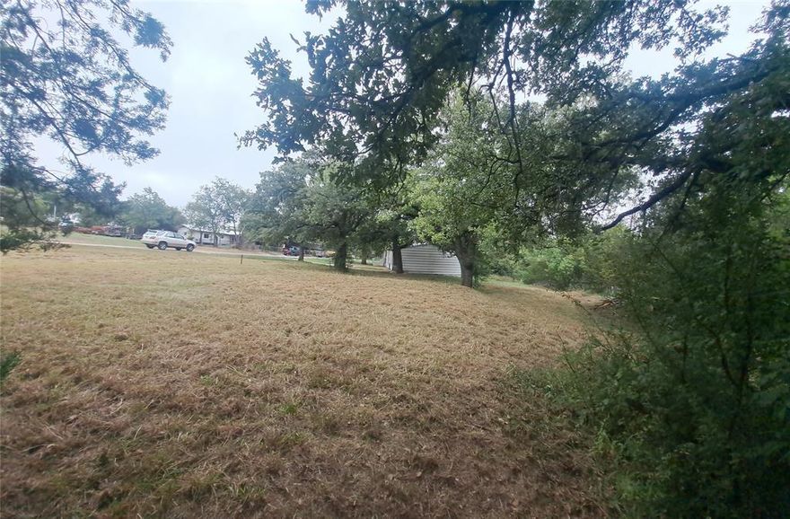 Looking for a good, site to build your home or maybe set your pre-manufactured home? you just found it!.
nice streets, get your kayak or boat, there is easy access to the lake, Community pool and park, this piece of land features a creek in the back outside of the line property that gives good drainage and add privacy to the property. Next door 5800 Arrowhead Dr. lot is available as well but seller will prefer to sell both together.