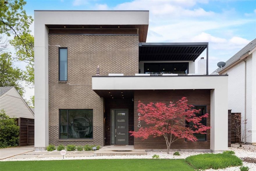 Nestled in the vibrant heart of Lakewood and zoned for the highly prestigious Lakewood Elementary, this 2015-built architectural masterpiece offers a flawless fusion of sophisticated modern design and effortless daily functionality. Spanning 4,414 square feet, the residence welcomes you with an expansive, light-drenched layout characterized by soaring ceilings and 7 inch wire-brushed white oak hardwoods that flow throughout. Every corner reflects a commitment to quality, from the designer lighting and plumbing fixtures to the cedar-accented ceilings that provide a warm, organic contrast to the home’s sleek aesthetic.

The heart of the home is a chef’s dream: a professional-grade kitchen featuring custom Ornare modern cabinetry, premium quartz countertops, a 48-inch Thermador range, and a Sub-Zero refrigerator. This culinary hub opens seamlessly to the main living area, where commercial-grade aluminum multi-sliding doors erase the boundary between indoors and out. Step through to discover one of three private patios and a meticulously maintained, low-maintenance turf backyard—an ideal sanctuary for both quiet relaxation and large-scale entertaining.

The thoughtful floor plan includes a spacious first-floor media-flex room and a secondary living area upstairs, providing ample space for work, play, or hosting guests. Beyond the aesthetics, this home is a model of sustainability and peace of mind, equipped with a fully owned Tesla solar panel system and a Tesla Powerwall (whole-home generator) for unmatched energy efficiency. Located just minutes from the scenic trails of White Rock Lake, the boutique offerings of Lakewood Shopping Center, and the neighborhood’s most beloved dining destinations, this turnkey property represents a rare opportunity to secure a show-stopping modern retreat in one of Dallas’ most coveted and cherished communities.