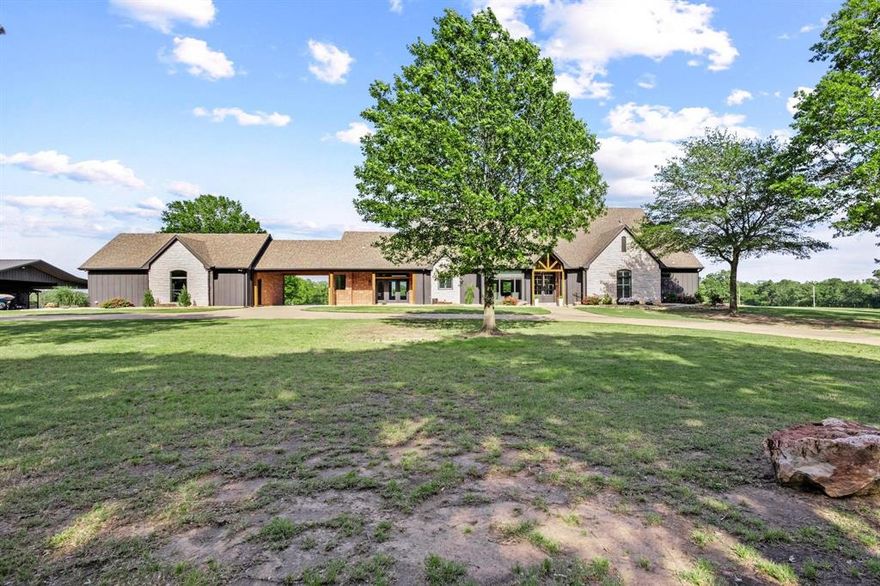 This 54-acre farm and ranch is set up and ready for livestock, hunting, and country living just 2.5 miles from Paris Texas on a quiet county road.

The home, pool, clubhouse, and sports court sit on 3 acres of beautifully maintained lawn, surrounded by open pasture, barns, and a 1.5-acre stocked pond and floodable duck slough for hunting.

The 4-bedroom, 4.5-bathroom home was redone in 2021. Every bedroom has its own private bathroom and walk-in closet. The living spaces have great views of the back patio, pool, and pasture.

The kitchen is built for entertaining, with a huge island and breakfast bar, proofing drawers, an ice maker, and an induction range with a double oven. The dining room is extra long, giving you plenty of space to host.

The yard is set up to enjoy, with a deep pool that has a spa, waterslide, and diving board, patio, and sprinkler system, all updated in 2022.

The detached three-car garage, breezeway, and carport at the clubhouse give you tons of covered parking. The clubhouse is fully finished out, heated, and cooled, with a full bathroom. It’s a great space for a media room, gym, office, guest quarters, or recreation.

The full-size sports court is surfaced with court tile, making it easier on your joints and playable even when wet. It’s set up for basketball, tennis, volleyball, and pickleball, with lighting and landscaping around it.

For animals, there’s a covered and fenced dog kennel, a horse shelter with a concrete floor, and a large 1,200 sq. ft. three-sided barn with electricity, water, and an attached 1,845 sq. ft. lean-to.

This beautiful homeplace is waiting for you!