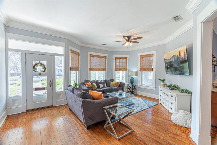 Discover your dream home in this stunning & classic 2600 ft.² home. The exterior has been completed with fresh paint and siding repairs, & a new roof installed in 2019. As you come up the sidewalk, you are greeted with mature trees & an oversized covered front porch. Step inside to the first living room, boasting tons of natural light & then into your dining room with custom built-ins. The kitchen features plenty of cabinet and shelf space and a breakfast room off to the side. The master bedroom features an ensuite bathroom with a shower, bathtub, & dual vanities. There’s also an additional sitting room which leads to the other two downstairs bedrooms and bathrooms. Step upstairs to another huge bedroom and family area. Once you’ve seen all there is to see inside come relax on your screened in back porch. The property also has a detached 1 car garage, 2 car carport, and a storage shed in the backyard. You don’t want to miss this home and it’s endless opportunities!