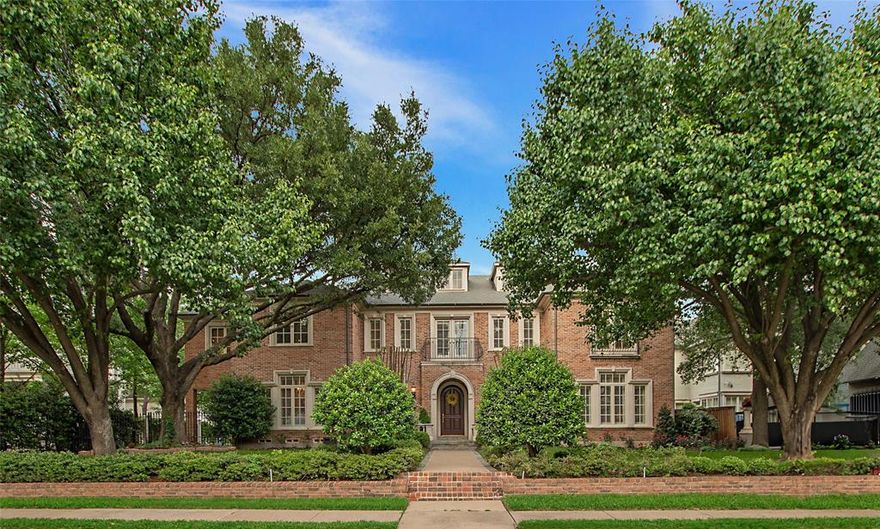 Introducing a rare and prestigious opportunity to own a truly remarkable residence in the heart of St. Andrews Place, one of University Park’s most exclusive areas. Nestled on an expansive almost half acre lot, this stately, traditional residence blends timeless elegance with refined comfort, offering a lifestyle of luxury & privacy. Custom built by Kathryn Forney Sargent, the home welcomes you with a grand two-story entry & a sweeping double staircase that sets the tone for the classic sophistication found throughout. Graced by a crystal chandelier, handsome hardwoods, cross beamed ceilings & wainscoting enhance the formal spaces, which are perfectly balanced by inviting, light-filled living areas designed for effortless entertaining. The heart of the home boasts an oversized sun-drenched great room overlooking the beautifully landscaped backyard. The space conveniently opens to a chef’s granite kitchen, appointed with premium appliances, custom cabinetry, an expansive breakfast bar & large light-filled breakfast area. Spacious entertainment spaces reveal an oversized game room perfect for casual gatherings & a richly paneled study offering a quiet, refined space for reading or reflection. The flexible floor plan features 5 spacious bedrooms, including a serene primary suite & a private office ideal for working from home. Step outside to your private oasis: an oversized columned covered patio overlooks a sparkling pool & spa plus lush grounds designed for year-round enjoyment. A detached 3-car garage includes full guest quarters above along with a private entrance to the property through its electric gate & porte cochere—ideal for extended stays or a separate studio-office. Situated across the street from the YMCA & within walking distance of Highland Park Village & Bradfield Elementary, this property is an exceptional find in one of Dallas' most treasured neighborhoods. Offered to discerning buyers seeking an unparalleled blend of tradition, luxury, and location.