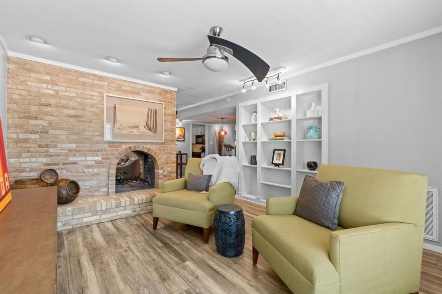 Updated 2 Bedroom, 2 Bath Condo in Gated Community of Summerset Village! Greeted with Laminate Flooring Flowing Throughout, Double Sided Fireplace connecting both Living Areas, Dining Room adjoining Living Areas...Ideal for Entertaining. Galley Kitchen onlooking Family Room w Breakfast Bar, Granite Countertops & Updated Backsplash. Primary Suite offers Ensuite Bath & Walkin Closet. Secondary Bedroom with Dual Closets. 2nd Floor Condo w Balcony Access from Family Room & Bedroom...Perfect for Morning Coffee or Evening Libation to Wind Down at the End of the Day. Community Includes Pool, Workout Room, Grill, Water & Trash. Assigned Parking in Covered Carport. Move In Ready...Easy Access to White Rock Lake, Lower Greenville, Park Cities & Major Highways!