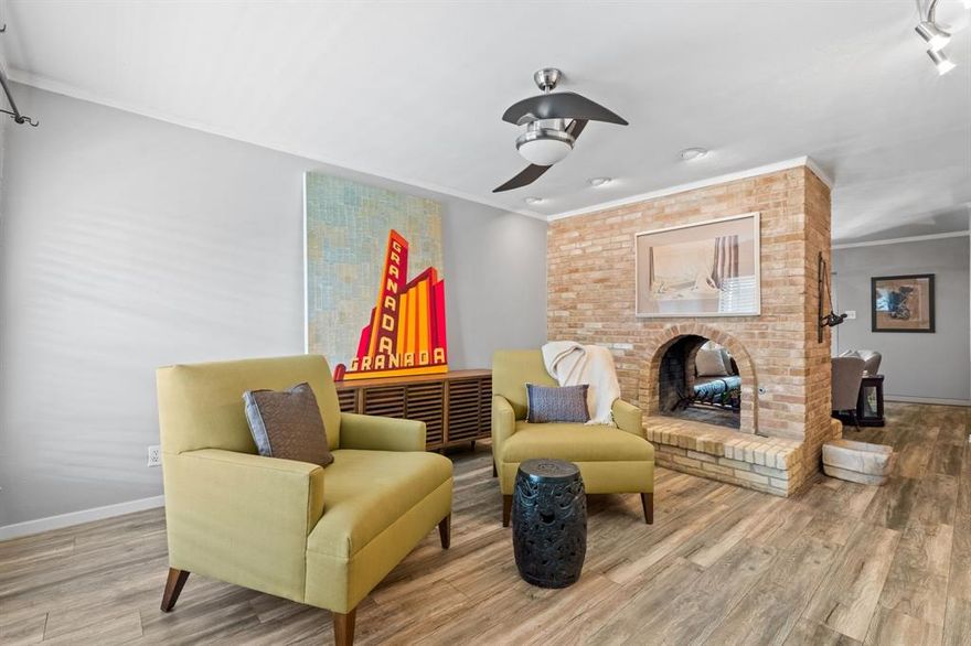 Updated 2 Bedroom, 2 Bath Condo in Gated Community of Summerset Village! Greeted with Laminate Flooring Flowing Throughout, Double Sided Fireplace connecting both Living Areas, Dining Room adjoining Living Areas...Ideal for Entertaining. Galley Kitchen onlooking Family Room w Breakfast Bar, Granite Countertops & Updated Backsplash. Primary Suite offers Ensuite Bath & Walkin Closet. Secondary Bedroom with Dual Closets. 2nd Floor Condo w Balcony Access from Family Room & Bedroom...Perfect for Morning Coffee or Evening Libation to Wind Down at the End of the Day. Community Includes Pool, Workout Room, Grill, Water & Trash. Assigned Parking in Covered Carport. Move In Ready...Easy Access to White Rock Lake, Lower Greenville, Park Cities & Major Highways!