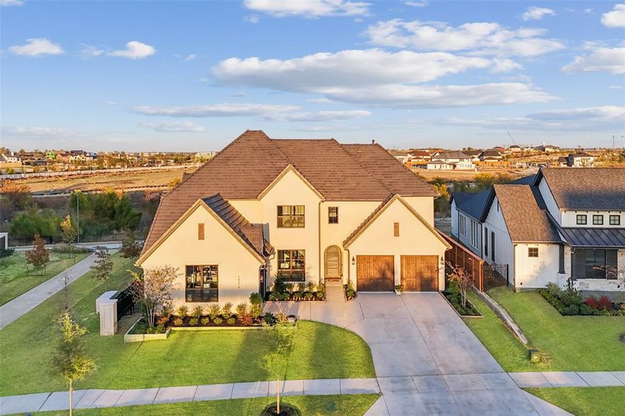 Nestled in the highly coveted The Fields neighborhood, this Toll Brothers Todd Chateau residence embodies sophisticated luxury, effortless comfort and modern elegance.  Revel in premium finishes, exclusive upgrades and awe-inspiring views from every corner. Stunning cathedral foyer leads to one of two studies with built-in bookcases, French doors and a view of the front park. Along with the study, the private media room and guest suite are included in the front wing. Primary bedroom suite with a wall of windows overlooks the lush backyard and park view and includes huge closet, luxurious bathroom and over-sized laundry room. The chef’s kitchen features enormous island, coffee bar, abundant counter and cabinet space, a large walk-in pantry and attached breakfast room. The open-concept den showcases rich hardwood floors, gas fireplace, sliding glass doors and seamless access to the covered outdoor patio. Upstairs you will find three additional over-sized bedrooms with walk-in closets, game room, study area and exercise room that opens to a grand balcony. Walking-distance access to the PGA, Fields West fine dining, shopping, and endless entertainment, as well as the new exciting Universal Studios Theme Park. Resort-style amenities include tennis and pickleball courts, a $14M state-of-the-art community center with a modern fitness facility and two resort-style pools. Wonderful Frisco ISD.