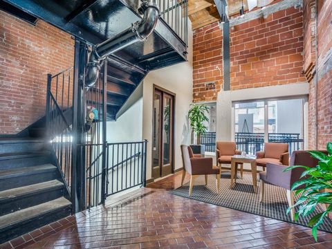 Photo of 509 Elm Street #405, Dallas, TX 75202 (MLS # 21204928)