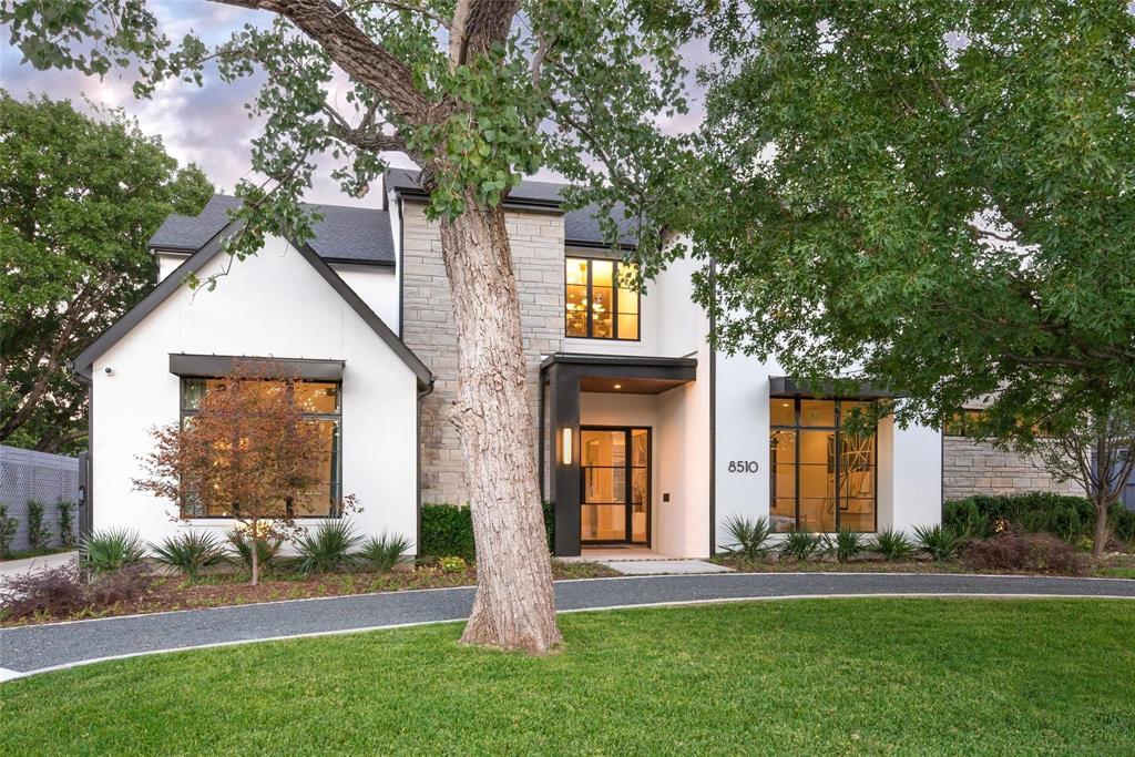 Elegant Belgium Farmhouse designed by award winning Architect John Lively & Associates, Constructed in 2019 by Martyn Hammer.  Located in Bluffview Estates on over .4 acre this 6,628 sq ft home with detached quarters of 500 sq ft including a 3+ car garage, saltwater pool & spa, extensive landscaping with putting green and pool bath.  The chefs kitchen along with oversized pantry is ready to entertain.  Master suite is 1,300 sq ft with oversized closet and bath, coffee bar and safe room.  Outdoor areas include 2 separate out door kitchen areas a 700 sq ft covered patio and outdoor tv's and fireplace.  Security cameras, lutron lighting and pool all controlled by your phone, a must see as ready to move into today.