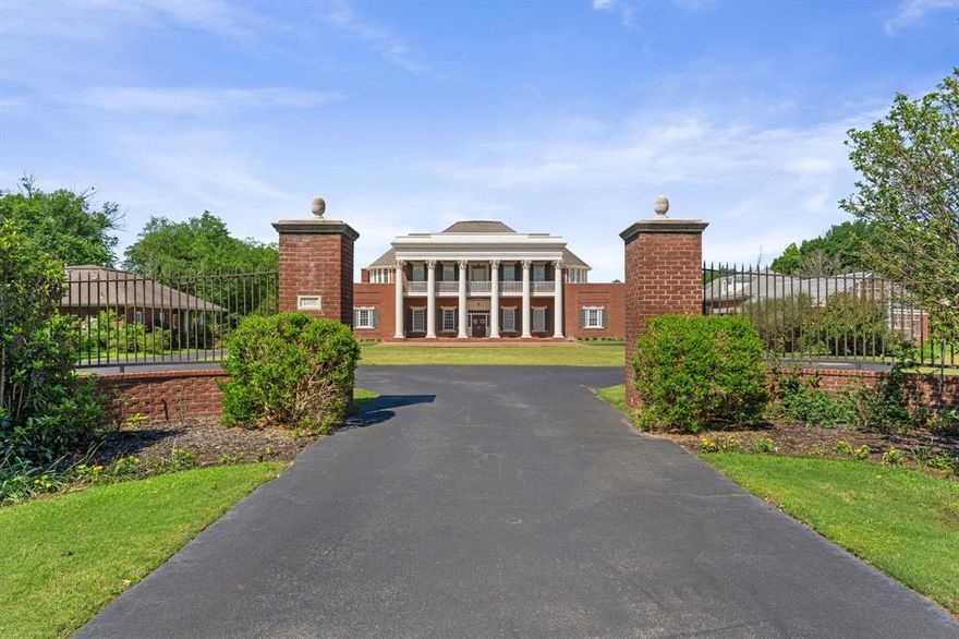 Inspired by the historic Hermitage Estate of Andrew Jackson, this one-of-a-kind luxury estate is located in the exclusive gated community of The Estates of Rush Creek in Arlington, Texas. Situated on just under 7 acres, and boasting of 8,800 SF property offers unmatched privacy, scale, and versatility in the heart of DFW. The stately main residence features expansive living areas, abundant natural light, and timeless architectural details, ideal for both everyday living and large-scale entertaining. Generous bedrooms, multiple living spaces, and refined finishes throughout create a seamless blend of historic charm and modern comfort. The grounds function as a private compound with multiple structures, including a guest house, greenhouse, and a separate music hall or bonus house—perfect for a studio, office, gym, or additional living quarters.
A private lake anchors the property, offering serene views and a rare resort-style setting in Arlington. Mature trees, open green space, and gated privacy provide a secluded retreat just minutes from major highways, dining, and entertainment in the Dallas-Fort Worth metroplex.
Rare opportunity to own a landmark estate with acreage, water features, and multiple residences in one of Arlington’s most desirable gated communities.