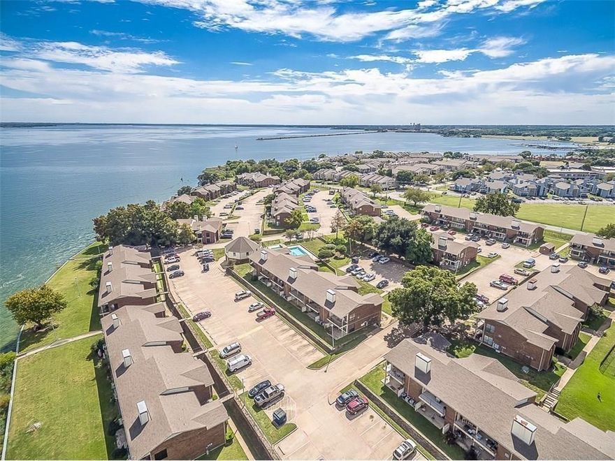 Welcome to this beautifully renovated 1-bedroom, 1-bath condo, located on the 2nd floor and perfectly positioned to take in breathtaking views of Lake Ray Hubbard. Imagine enjoying sunsets from your window or stepping out to experience the lake lifestyle with fishing opportunities, canoe storage nearby, and scenic walking trails just steps away. This move-in ready home boasts modern upgrades, including granite countertops, an updated bathroom, and a refrigerator that conveys with the property. Enjoy access to a sparkling community pool and the flexibility of short-term rentals. Conveniently located close to shopping, restaurants, and with easy access to I-30 and President George Bush Tollway, this condo is a rare find for lake lovers and savvy investors alike. Don’t miss the chance to call this lake-view paradise your own!