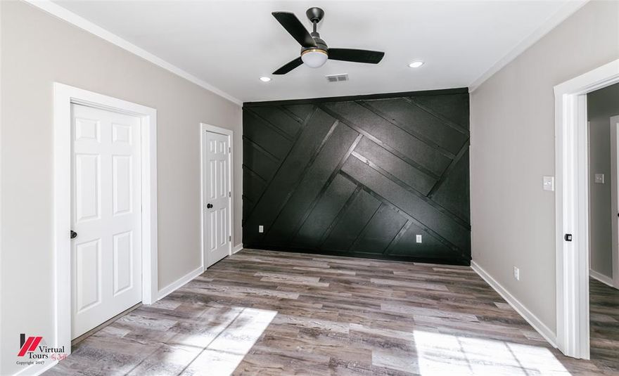 This beautifully renovated modern farmhouse in Greenwood is full of personality, comfort, and high-end touches throughout. Thoughtfully redesigned, this home features all-new plumbing, electrical, HVAC system, and water heater, giving buyers the peace of mind that the big-ticket updates are already done.

From the moment you walk in, you’ll notice the quality and attention to detail. The living room features a custom accent wall with rustic wood tones, luxury vinyl plank flooring, recessed lighting, and a layout that flows seamlessly into the dining and kitchen areas. The kitchen is a true showpiece — complete with butcher block countertops, stainless steel appliances, shaker-style cabinets, a bold black hex tile backsplash, matte black finishes, and a spacious walk-in pantry for extra storage and functionality.

The private primary suite offers dual closets, a bold modern accent wall, and a spa-style ensuite with a double vanity and oversized walk-in tiled shower. The second full bathroom features stylish tilework, updated fixtures, and a clean, modern feel. A large laundry room with custom shelving and cabinetry adds both convenience and charm.

Outdoors, the property offers a spacious lot with a concrete driveway and additional parking space. Whether you’re looking for modern design, upgraded systems, or a move-in ready home with character, this one checks all the boxes. Located just minutes from Shreveport, this Greenwood gem is ready for its next chapter.