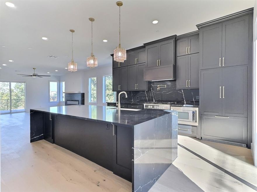 Don’t miss this exceptional opportunity to own a sophisticated three-story townhome perfectly positioned on the waterfront with panoramic views of the Fort Worth skyline and the Trinity River. This elegant residence offers 3 spacious bedrooms, 3.5 luxurious baths, and an open-concept floor plan filled with radiant natural light that enhances the modern, airy ambiance throughout. Contemporary finishes and thoughtful design details elevate every room. The living area has a striking color-changing fireplace, creating the perfect atmosphere for both relaxation and entertaining. The expansive owner’s suite also offers breathtaking views—ideal for morning coffee on the covered balcony or evening stargazing. Additional highlights include a short walk to Top Golf, a brewery, e-bike and Trinity Trails, Wi-Fi capability for secure Amazon deliveries, a tankless water heater, and individual high-efficiency HVAC systems on each floor to maximize comfort and energy savings. Elevator-ready with space allocated for future installation. Located in an exciting, up-and-coming neighborhood, this townhome is not only a beautiful place to live but a smart investment for the future. Multiple units for sale. Schedule your private tour today—this is a rare gem!