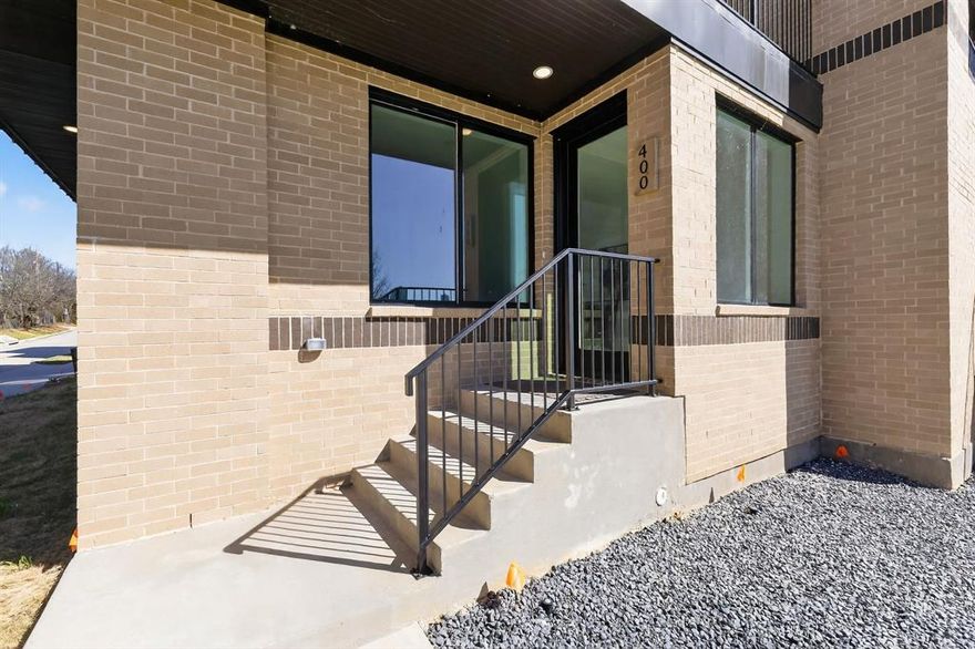 Don’t miss this exceptional opportunity to own a sophisticated three-story townhome perfectly positioned on the waterfront with panoramic views of the Fort Worth skyline and the Trinity River. This elegant residence offers 3 spacious bedrooms, 3.5 luxurious baths, and an open-concept floor plan filled with radiant natural light that enhances the modern, airy ambiance throughout. Contemporary finishes and thoughtful design details elevate every room. The living area has a striking color-changing fireplace, creating the perfect atmosphere for both relaxation and entertaining. The expansive owner’s suite also offers breathtaking views—ideal for morning coffee on the covered balcony or evening stargazing. Additional highlights include a short walk to Top Golf, a brewery, e-bike and Trinity Trails, Wi-Fi capability for secure Amazon deliveries, a tankless water heater, and individual high-efficiency HVAC systems on each floor to maximize comfort and energy savings. Elevator-ready with space allocated for future installation. Located in an exciting, up-and-coming neighborhood, this townhome is not only a beautiful place to live but a smart investment for the future. Multiple units for sale. Schedule your private tour today—this is a rare gem!