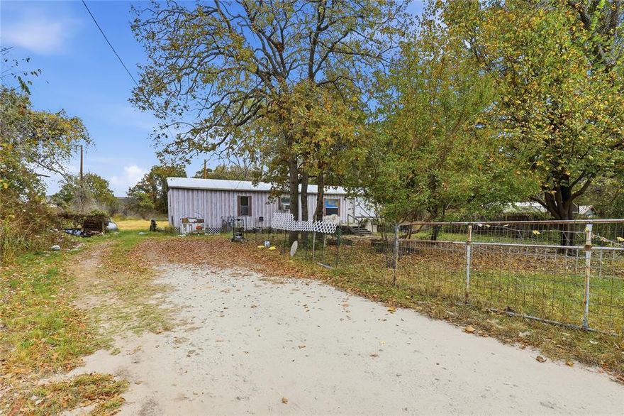 Check out this 2 bed 1 bath mobile home on a .17 acre lot! This home is in need of repairs and updates but would make a great homestead or rental property. To be sold as is, seller will make no repairs. Schedule a showing today!