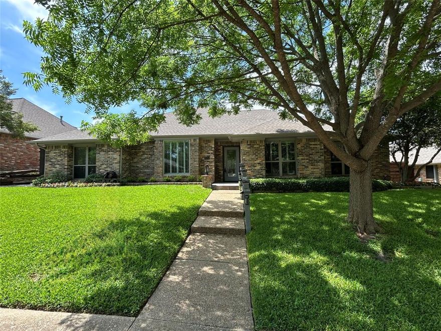 Tastefully updated, meticulously maintained home located in the highly sought-after Lake Highlands neighborhood and desirable Richardson ISD. This home features 4 bedrooms, 3 full bathrooms, 2 living areas and a study. Ten-foot ceiling heights and open floor plan create a comfortable yet sophisticated living area with a gas log fireplace, wet bar, and plenty of windows offering a panoramic view of the backyard oasis. Updated eat-in-kitchen that opens to the living area through a breakfast bar is perfect for entertaining and features granite countertops, Kitchen Aid double ovens, 6 burner Viking induction cooktop, built-in microwave and Avanti wine fridge. Adjacent to the kitchen is a sizable 2nd living dining space that leads to a private bedroom and bathroom area creating the perfect mother-in-law suite. Luxurious primary bedroom boasts 9-foot ceilings and French doors access the covered patio, sparkling pool and spa, lush landscaping and turfed areas for minimal maintenance. The en-suite bath includes a large walk-in shower, private water closet, double vanity and 2 walk-in closets. Secondary bedrooms and bathrooms are spacious and ideally appointed. Separate laundry-mud room opens to the backyard and garage.  Other updates include wood laminate flooring and recently painted throughout, decorative light fixtures and ceiling fans, 8-foot board on board fence with arched gates, updated electrical box with surge protector, all new concrete retaining wall, attic insulation with cellulose and fiberglass blown in R-30 insulation, roof-gutters, windows and more.