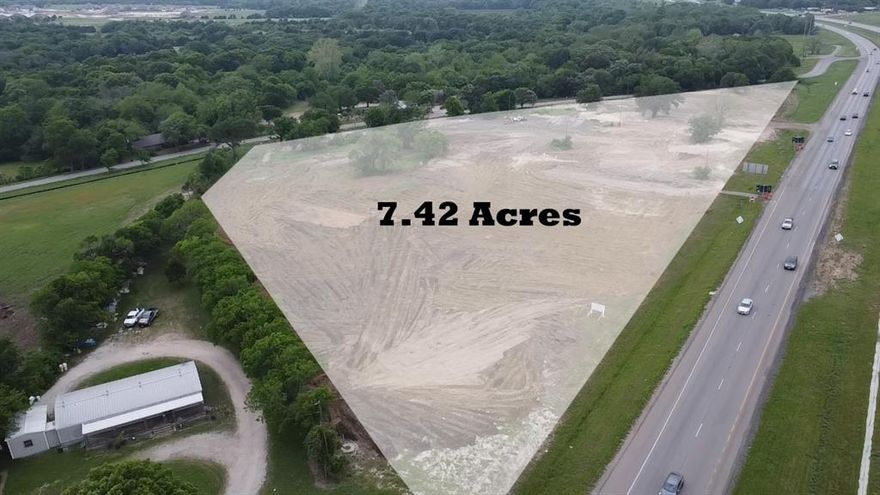 7.42 Acre lot composed of 3 parcels. Utilities nearby. Relatively flat and ready to develop. (1) Entrance off of Hwy 287 and a couple off of Shady Grove.  Zoned AG.  Great Commercial, Retail, Industrial, Mix Use site.  Excellent visibility from highway in a growing city.  12,000 to 50,000 cars a day.
