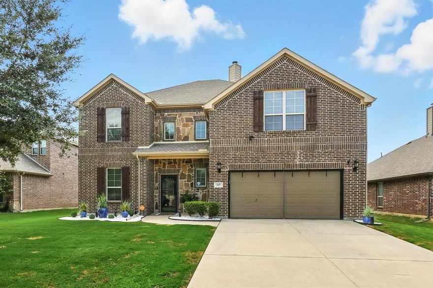 From the moment you step inside, this home makes an impression. The soaring foyer sets the tone with its spindle iron staircase and open catwalk, creating a sense of space that feels both grand and inviting. Just off the entry, French doors lead to a private office, offering the perfect balance of productivity and quiet retreat. The living room is filled with natural light and anchored by a striking stone fireplace, while vaulted ceilings and rich wood floors create a warm, elevated feel. It’s a space designed for both everyday living and effortless entertaining. The kitchen opens seamlessly to the main living areas, featuring custom cabinetry, granite countertops, a large island, and a walk-in pantry. Whether it’s morning coffee in the breakfast nook or hosting friends and family, everything flows with ease. Tucked away downstairs, the primary suite offers a peaceful escape with a spacious ensuite bath, dual sinks, and a walk-in closet designed for function and comfort. Upstairs, a versatile game room, Jack & Jill bedrooms, and an additional bedroom provide flexibility for whatever life looks like, whether it's guests, hobbies, or growing needs. Out back, the covered patio overlooks a backyard that’s just the right size to enjoy, making it easy to relax and unwind at the end of the day. This home brings together space, style, and everyday livability in a way that simply feels right the moment you walk in.