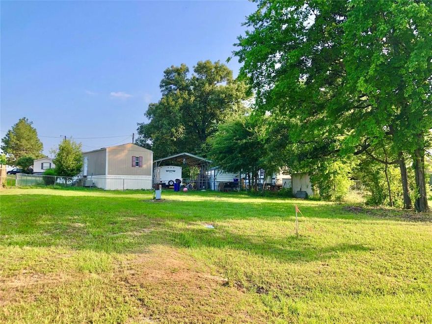 Lake Fork Living. Nice Flat 80'x80' Lot with a Few Trees Shade Trees. Located in a Gated Waterfront Community on Beautiful Lake Fork. Water, Electric, Sewer, Driveway, and Culvert are in Installed. Ready for you to make your Home or Fishing Getaway. Buyer to Pay for Survey and Title Insurance if Needed. Holiday Village Does Allow Full Time RV Living, Short and Long Term Rentals. Modular and Mobile Homes must be under 5 years of age to be allowed to move onto the property. Mandatory HOA is $50 a month. Well Water Filtration Facility and Sewer are $65 Each to Use a month. High Speed Internet and Cable are Available. Bring your Golf Cart, ATV, Boat, and Fishing Pole! Community Benefits Include Common Fishing Piers, Boat Ramps, Stocked Fishing Ponds, Clubhouse, Table Games, Salt Water Pool, Playgrounds, Putt Putt Golf, Basketball Court, Laundry Mat, Picnic Areas, and Bait Shop. Monthly Potluck, Bingo, Bunco, Karaoke and Paint Classes. Weekly Social Clubs Available to Attend.