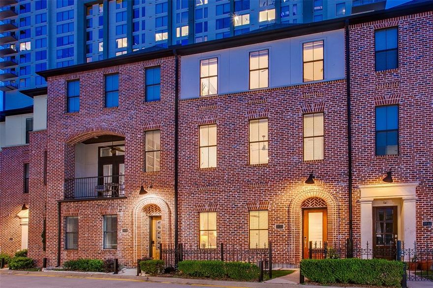 Location is everything! Experience the best of city living in this immaculately maintained turn-key townhome, located mere steps from some of Dallas' newest parks, acclaimed restaurants, and the bustling downtown Farmers Market! Entering from your private fenced in yard, step inside to gorgeous arched ceilings, crisp clean lines, and an abundance of natural light. The first level showcases an expansive secondary bedroom with its own ensuite bath, along with the spacious two-car garage complete with an oversized garage door and additional storage space. On the second floor you’ll find soaring ceilings to accompany the open concept living, dining and eat-in kitchen area, all anchored with rich, newly refinished hardwoods throughout. Cook up a storm in the chef-inspired kitchen, which includes new stainless steel appliances and beautiful, recently repainted custom cabinetry and a great size pantry. Taking you to the third level you’ll have an additional secondary bedroom with another ensuite bath, along with the show-stopping owner’s retreat, which allows for ample space for a second sitting area or home office, and the walk-in closet of your dreams! No detail has been spared in the maintenance of this gorgeous townhome - even on the rooftop deck - providing stunning 360 degree views of neighboring Deep Ellum and downtown. Enjoy true lock-and-leave living with low HOA in this sophisticated, tucked-away oasis with an incredible walking score of 95! This isn’t just a home, it’s a lifestyle.