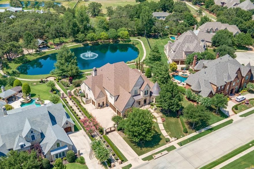 Welcome to Water Views You Won't Believe! This home backs to HOA property with Pond, Park and Playground. By far the Best View in the neighborhood. Gated Castleton Manor in Colleyville! This custom built, one owner home has been meticulously cared for. The quality of this home and the attention to details are unparalleled!  Be sure to take note of the ceiling treatments throughout this home. Don't miss the hidden rooms behind the wet bar, on the landing behind the bookcase, and two upstairs bedrooms, providing lots of storage. There is even a golf cart lift in the garage! If you are looking for a well-designed home with a beautiful water view, this is the one! Truly a rare find! HOA is run by the homeowners! No property management! The HOA maintained pond and play-ground sit directly behind this home, hence the absolute best view in the neighborhood! Sparkling pool is flanked by a spa, 4 fire pit columns and a bubble feature. Landscaping is very well thought out and cared for.