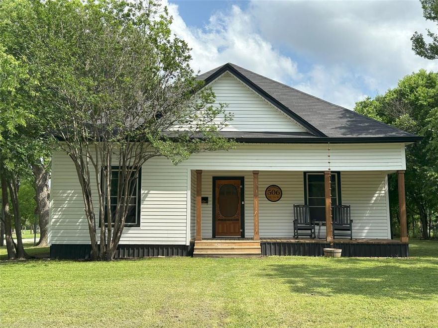 What a gem! Take a look at this recently remodeled Craftsman style home. As you walk up you'll notice the beautiful wood porch. Perfect for nice days and a rocker. Open the period style screen door and vintage like, front door and you're standing in a spacious receiving hall so commonly found in homes built in the forties. Turn left and you find yourself in a cozy living room that adjoins a fantastic period kitchen with some modern amenities. The kitchen features wood laminate floors, farm sink, splendid wood counters, open shelving and closed lower cabinets. Comes complete with a beautiful gas range and dishwasher. Plenty of room for a large table in the dine in area. Just off the kitchen to the rear is the pantry. Cross the hall and you're in the primary bedroom featuring a closet, ceiling fan and full bath with shower. There's one more bedroom downstairs towards the front of the house with carpeted floors and ceiling fan. Up the refinished stairway leads to an upstairs loft and bedroom with two closets. If you don't need a bedroom then use it as a craft room, quilting room or office. It'll be your house you decide what to do with it. Out the back door you'll find yourself on a large, deck style, back porch. The utility room is located here and has a separate door, comes equipped with a washer and dryer. The house features fresh carpet, vinyl siding, fresh paint, modern gas heaters, fantastic replacement windows that are triple pane and designed for efficiency and ease of use and cleaning. There are custom fitted window shades located on site that haven't been installed but will convey. Hubbard is centrally located between Waco and Corsicana on Hwy 31 and the I35 I45 corridors, allowing easy access to Dallas, Ft Worth, Austin and Houston. Come try a slower paced lifestyle. Come experience a little Americana at its finest. Mature trees on lot, pecan and crepe myrtle. 
SELLER IS OFFERING BUYER $8,000 AT CLOSING FOR CLOSING COSTS OR HVAC.