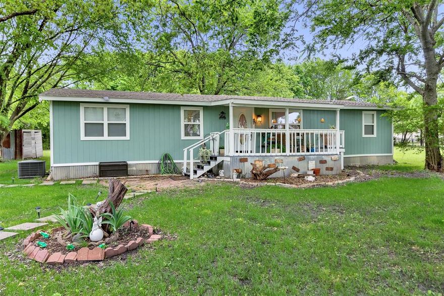Country Living under the trees! Mature trees on small acreage with a 4-bedroom frame home, separate building that can be finished out for guest quarters or entertaining, covered patio, fencing and a gate to enjoy your privacy. Quiet neighborhood with easy access back to Melissa and McKinney. This property is a great place to raise a family, enjoy nights out under the stars around a fire pit, have sheep and chickens or just let the children run and play for hours in the large, fenced yard. There are so many possibilities, let your imagination lead you and your dreams come true!