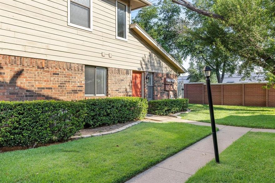 This nicely updated has all the appliances, including a TV and a washer and dryer. It features a wood-burning fireplace and ample natural light. There is also a large patio for outside entertaining. There is good closet space. The master is downstairs, and there are two bedrooms and a full bath upstairs. Access to community pools on-site. Owner pays HOA fee, which covers water, trash, sewer & landscape maintenance. Tenant to pay for electric, cable, internet & renters insurance. No garage, only 1 covered parking space per condo, remaining parking spots are uncovered and are first-come, first-served. Good access to the Tollway and the Addison entertainment district. The condo is zoned to Dallas ISD schools, not Carrollton schools. This is a non-smoking property. Dogs ok but the animal and deposit for that animal are decided on a case-by-case basis.  APPLICATION FEE IS non-refundable $50 PER EACH ADULT 18+. FIRST MONTH'S RENT AND SECURITY DEP REQUIRED FOR MOVE-IN. MUST MAKE 3X RENT.