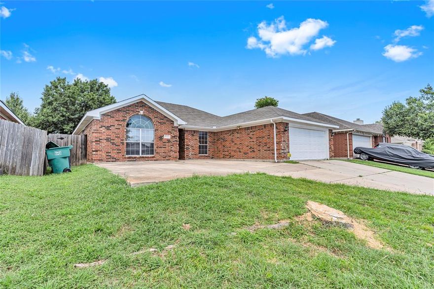 Welcome home to this beautiful cozy house nestled in a nice neighborhood, with 3 bedrooms, 2 baths, kitchen, breakfast nook,2 living areas and adjoining dining area and huge yard with covered patio, for gatherings or play.  Primary bedroom features barn door into the updated bathroom. This is a great home for a new beginning and to make new memories.  Elementary school is walking distance, down the street. Fridge is included.