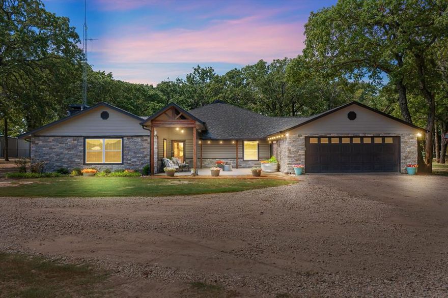 Welcome to this rare ranch estate offering modern living, income potential, and resort-style amenities. Enter through a commercial-grade gated entrance with pipe fencing and a tree-lined drive that sets the tone for this one-of-a-kind property. The land is mostly cleared, cross-fenced for cattle, and in hay production with Tifton 85 in back meadows and coastal Bermuda up front. At the heart of the property is a stunning 5 ±ac stocked lake with fishing pier and pavilion, creating the perfect setting for relaxation and recreation.
The modern ranch-style main home offers 4 BR, 3.5 BA, plus a large bonus room that can serve as a 5th BR. With two spacious living areas, open-concept layout, fresh paint, abundant natural light, and recently installed wood laminate flooring, the home feels like a retreat. The renovated kitchen features custom cabinetry, quartz countertops, and a large walk-in pantry. The primary suite has been completely remodeled with a walk-in shower and custom walk-in closet. Additional updates include patio lighting, trimmed porches with added lights, and a mudroom with custom storage. The main house also includes a 60’ Wi-Fi tower providing internet and TV service.
Outbuildings include two 3,600 ±sqft shops with electricity and concrete floors, a shed with electricity, and a storage container. The property also includes two additional residences: a 2016 3 BR, 2 BA manufactured home (1,392 ±sqft) and a 1,077 ±sqft 2 BR, 1 BA guest home with garage, shed, covered porch, turfed backyard, granite counters, and open concept.
Additional amenities set this property apart: a basketball court, playground, outdoor pavilion, and a chapel. This estate combines ranch functionality, luxury living, recreation, and multi-generational flexibility in one. Whether you’re looking for a working ranch, private retreat, or family estate, this property has it all!