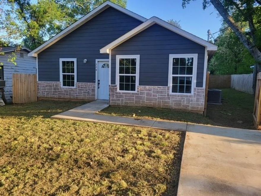 Come see this beautiful new home! Located close to town in a quiet neighborhood, it has so much to offer.  3 spacious bedrooms with walk in closets.  The open concept living area is large and inviting.  The kitchen has lots of storage and granite countertops.  You will love the large kitchen island! The primary suite is located at the back of the house, with an oversized walk in closet and a beautiful on suite bathroom featuring a large walk in shower with gorgeous tile work and separate vanities.  The backyard is spacious and has a nice privacy fence.  The seller will consider a lease or lease purchase.  Call today for terms!