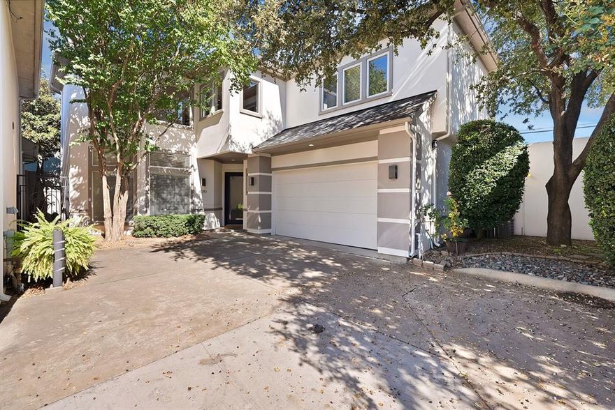 Rare opportunity to own a home in one of Oaklawn’s few GATED neighborhoods—a serene haven tucked within the heart of Dallas. This beautifully maintained residence blends modern updates with timeless comfort, offering a spacious, open floor plan designed for entertaining. An extended driveway provides private parking, while inside, wood floors flow through the bedrooms and closets, enhancing the home’s warm and inviting feel. The remodeled kitchen is a chef’s dream, featuring sleek countertops, new INDUCTION cooktop, hood, ovens, and sink, along with convenient pull-out trash and recycle bins. Natural light fills the home through newly replaced windows and updated Milgard sliding and French doors, creating an airy, refined atmosphere. The primary suite offers a renovated bath with a new shower door, double shower heads, upgraded toilet, vanity, and a modern heater and exhaust fan for daily comfort. Throughout the years, every detail has been thoughtfully maintained and improved. Major updates include two new water heaters with a hot water recirculation system, a refreshed fireplace with a contemporary design, newer washer and dryer, updated ceiling fan and lighting, and fresh exterior paint completed in 2024. A home security system with cameras adds peace of mind, while a 2025 HVAC tune up and professional vent cleaning ensure the property is as functional as it is beautiful. From the extended driveway with 3 dedicated parking spaces and private patio to the modern kitchen and elegant finishes, this home offers a rare combination of privacy, style, and convenience. Located just minutes from Dallas’ best dining, nightlife, and shopping, it provides the perfect retreat from city life—without ever leaving it!
