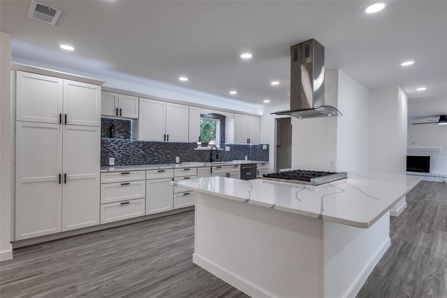 Fully renovated Lochwood Estates home featuring modern upgrades, a rare two-story
layout, and a huge backyard. This move-in-ready property offers a bright open-concept
floor plan with brand new flooring, fresh interior paint, recessed lighting, and designer
fixtures throughout. The spacious living area is centered around a stylish white brick
fireplace and flows seamlessly into the dining area and beautifully updated chef’s
kitchen.
The redesigned kitchen includes quartz countertops, custom cabinetry, a large
peninsula, modern tile backsplash, and premium Viking appliances including a
professional gas range—perfect for everyday living and entertaining.
A rare feature for the neighborhood is the private upstairs primary retreat, creating a
peaceful separation from the main living areas and offering a spacious, quiet sanctuary.
Additional upgrades include a new HVAC system, new windows, updated plumbing, and
modern finishes throughout.
Situated on an oversized lot, the property features a huge backyard and secure iron
driveway gate, offering excellent privacy and space for entertaining, pets, or a future
pool and outdoor living area.
Located in the desirable Lochwood Estates neighborhood near White Rock Lake, parks,
shopping, dining, and major highways, this home combines modern finishes, functional
design, and an exceptional Dallas location.