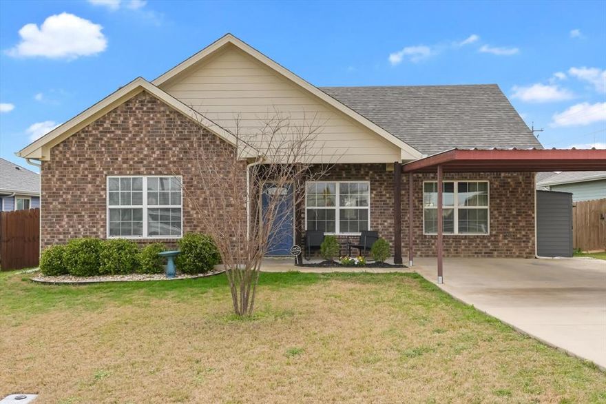 Welcome to this 3-bedroom, 2-bath home built in 2019 located in the heart of Sanger, just minutes from Denton with convenient access to I-35. This thoughtfully designed single-story home offers 1,272 square feet of comfortable living space with modern finishes and a functional open layout and NO HOA. Inside, you'll find luxury vinyl plank flooring, neutral paint tones, and abundant natural light throughout the main living areas. The spacious living room flows seamlessly into the kitchen, creating an ideal space for everyday living and entertaining. The kitchen features granite countertops, white cabinetry, stainless steel appliances, and a breakfast bar, offering both style and practicality. The primary suite features vaulted ceilings, a relaxing retreat with plenty of space for a king-size bed and additional furniture. The ensuite bath includes dual sinks, granite counters, and a walk-in tiled shower with glass enclosure. Two additional bedrooms provide flexible options for guests, family, or a home office. Step outside to a backyard designed for enjoying Texas evenings. The covered patio with pergola-style structure creates a comfortable outdoor living area perfect for grilling or relaxing. The backyard also features a stock tank pool with surrounding deck, adding a fun and unique outdoor feature for cooling off during the summer months. A storage shed provides additional space for lawn equipment, tools, or hobby storage. Additional features include a covered carport, extended driveway parking, full fencing, and interior laundry room. This home offers modern construction, move-in-ready condition, and great outdoor living space at an approachable price point in Sanger ISD, making it an excellent option for first-time buyers, investors, or anyone looking for low-maintenance living near Denton. Less than .5 miles from downtown Sanger and Babe's restaurant. 

Come see why this property offers a great blend of comfort, functionality, and backyard lifestyle.