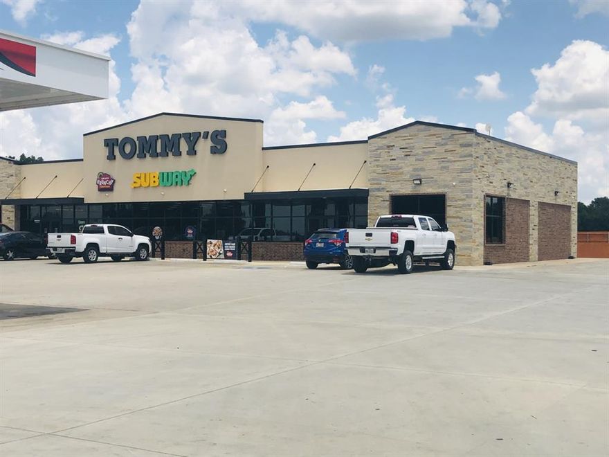 Convenience store end cap. Unfinished open space. Design space the way you like. Landlord will provide allowance for completing interior walls, handicap restroom, dropped ceiling with lighting and demising wall for storage or office space. Drive through window is an option. High traffic location. See Transaction Desk for floorplan.