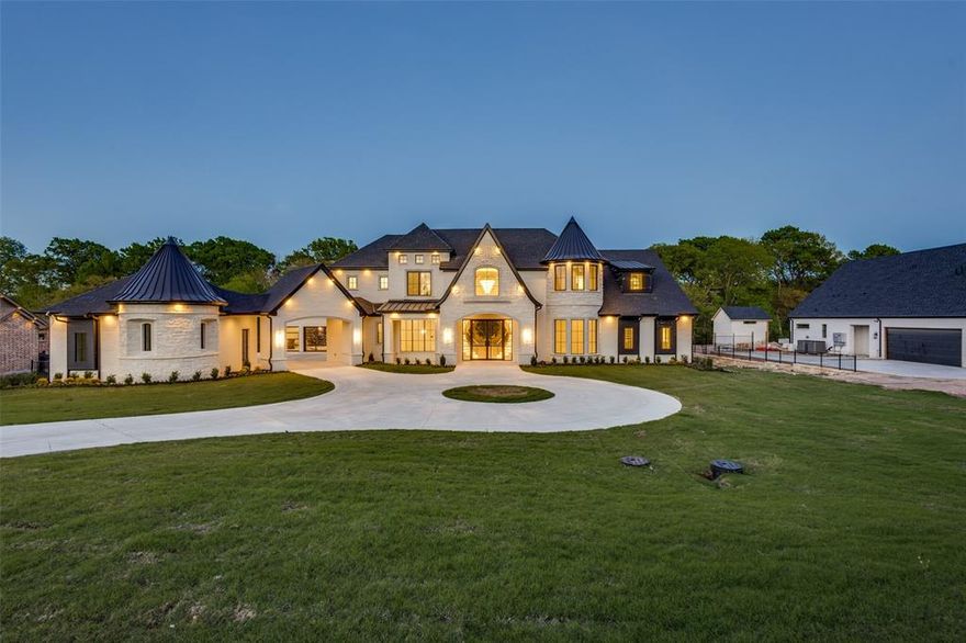 Experience refined living at 4636 Lake Breeze Drive in McKinney—an extraordinary estate blending grand scale, thoughtful design, and modern innovation on over an acre of private, serene land. The home’s impressive presence is undeniable, showcasing a striking architectural design and an expansive 5-car garage that sets the tone for the luxury within. Greeted by multiple staircases, sweeping spaces, and an abundance of custom built-ins that blend elegance with everyday functionality. Designed for elevated living and effortless entertaining, featuring 6 spacious bedrooms and 7.5 luxurious baths, each crafted with exceptional attention to detail. Multiple fireplaces create warm, inviting gathering spaces, while expansive living areas flow seamlessly, enhanced by walls of oversized windows that fill the home with natural light and capture peaceful, private views—with no backing neighbors. Thoughtfully designed for both comfort and versatility, the home also includes a dedicated prayer room offering a quiet, private space for reflection, as well as a reinforced storm room for added safety and peace of mind. Additionally, the property is prewired for a future elevator, providing convenience and long-term accessibility.. The gourmet kitchen is a true centerpiece, featuring a built-in refrigerator, extensive cabinetry, and generous prep and storage space to satisfy even the most discerning chef. Throughout the home, abundant storage ensures a place for everything while maintaining a clean, sophisticated aesthetic. Upstairs, sound-dampening construction creates a peaceful retreat—ideal for relaxation, guests, or multi-generational living. Every detail has been carefully curated, including pre-wired smart home capabilities that allow seamless integration of modern technology. Set on a sprawling homesite with endless potential to create your own outdoor oasis, this property offers a rare blend of luxury, space, and tranquility—all close to McKinney’s finest amenities.
