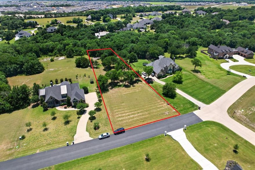 Excellent 1.11 acre lot in the highly soughted gated community of Waterstone Estates. This lot offers trees at the back half of the property and cleared at the front to allow for an easier build job for your dream home. The neighborhood has 4 lakes, ponds, a private fishing pier, lakeside park, soccer field, picnic pavilion, and basketball court. The lot is less than 10 miles to Downtown McKinney, with conveniences to all of the attractions in the metroplex