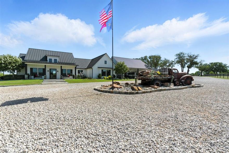 Welcome to an exceptional premier horse property where luxury meets equine excellence. Nestled on expansive, manicured acreage, this custom-built farmhouse offers timeless charm and modern comfort, designed with thoughtful detail for both owners and equine companions. The main home exudes farmhouse elegance with spacious living areas and serene views of the ranch. Horse lovers will appreciate the oversized barn featuring oversized stalls, each equipped with automatic waterers, and an attached 1,200 sq ft studio apartment—perfect for guests, trainers, or short-term rental potential. The property includes a lighted outdoor arena,, along with a professional-grade aquatred system to support equine conditioning and rehabilitation. Multiple turnout pastures, ample covered parking, worker quarters, and carefully planned infrastructure make this a fully functional and income-producing horse facility. Whether you're a professional trainer, breeder, or simply seeking a luxury equestrian lifestyle, this ranch has it all—function, beauty, and opportunity. A rare offering for serious horsemen—schedule your private tour today.