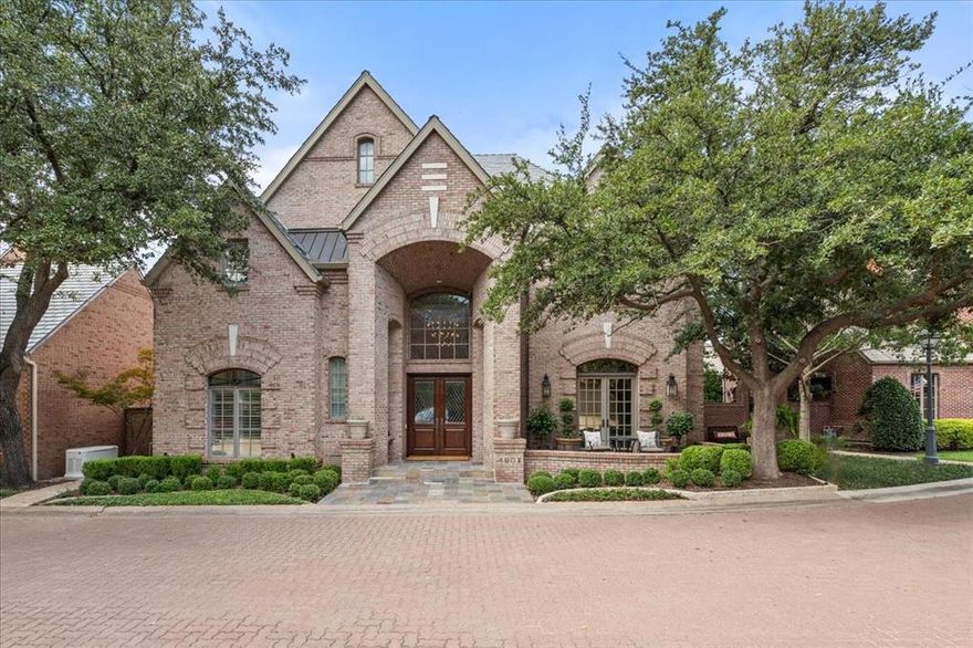 Location is key for this stunning home in the desirable gated Westbriar neighborhood in Overton Woods. Remodeled top to bottom combines luxury, comfort and timeless design. The open concept main level connects the kitchen, living, dining and keeping room, perfect for entertaining. Vaulted wood beamed ceilings, fireplaces, and custom draperies throughout add sophistication and warmth. A wet bar links the kitchen and dining area for seamless gatherings, while a powder bath provides added convenience. The chef's kitchen features a Wolf cooktop, double ovens, two warming drawers, Sub-Zero refrigerator, wine refrigerator and two additional refrigerator drawers. A versatile office-game-mahjong room with built in wood shelving, fireplace, and views of the courtyard and pool. The main floor primary suite is a private retreat with new carpet, serene courtyard and pool views, and a retractable screened porch. The spa inspired bath includes heated floors, dual closets, and luxurious finishes. An additional main floor en-suite bedroom offers comfort for guests. Upstairs, an oversized en-suite bedroom features new carpet, fresh paint and a remodeled bath. A second en-suite bedroom includes a remodeled bath and an adjoining bonus room perfect for TV lounge or craft room. The elevator provides convenient access to the lower level, which includes a space ideal for a workout room and direct entry to the two car garage and the separate one car garage. The outdoor living includes a private courtyard with new decking and tile for the pool and hot tub, fire pots, tranquil water features, and a built-in gas grill. Two screened porches with retractable panels one off the keeping room and one off the primary suite provide additional spaces for relaxing and entertaining. Additional features new Generac generator.