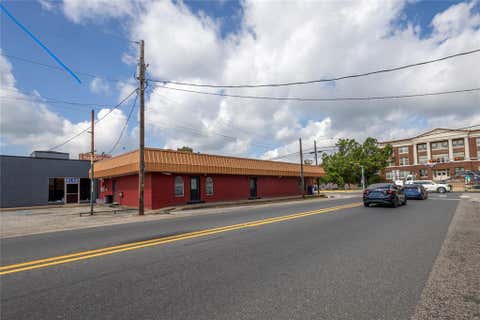 Photo of 101 S Main Street, Quitman, TX 75783 (MLS # 21351655)