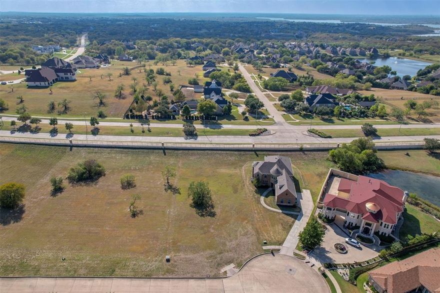 Build your dream home in the prestigious Lake Ridge Community. This scenic lot offers beautiful views and a peaceful setting near Joe Pool Lake, golf courses, dinning, and shopping, with easy access to Downtown Dallas and Fort Worth.